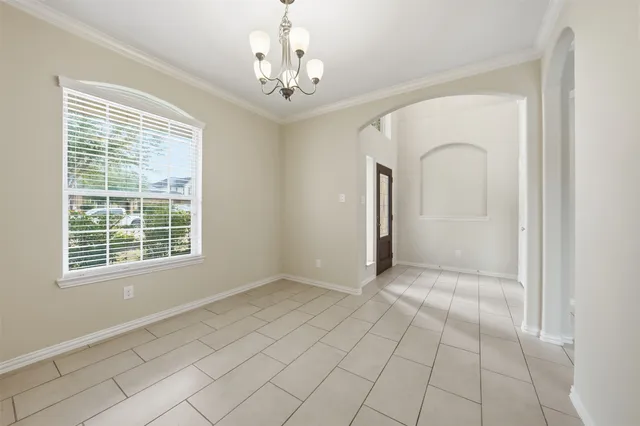 a bathroom with a granite countertop bathtub sink and mirror