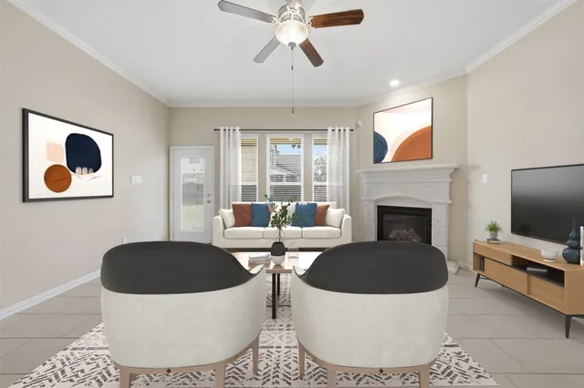 a living room with a couch and a flat screen tv