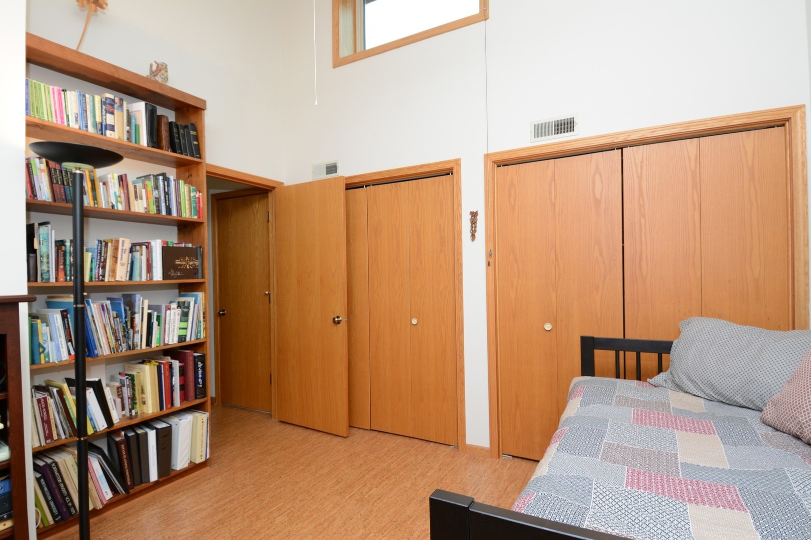 37W271 Weld Road Elgin, IL 60124 - Photo 17 of 34 a bedroom with a bed and a book shelf
