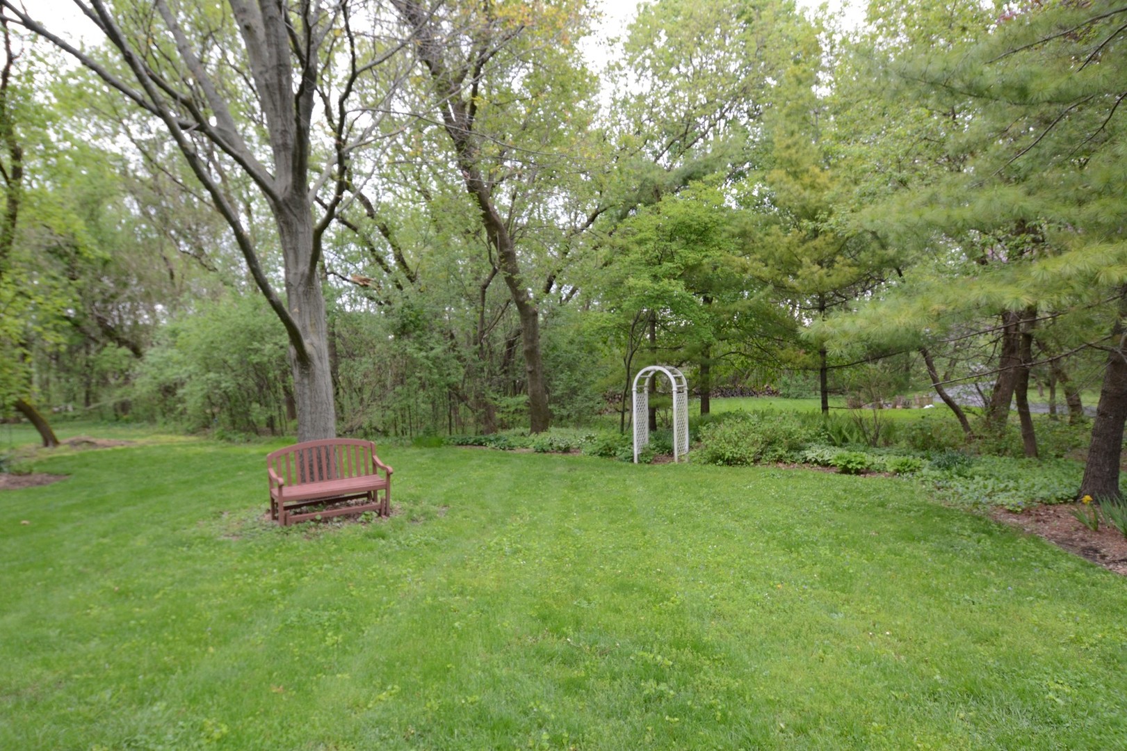37W271 Weld Road Elgin, IL 60124 - Photo 28 of 34 a view of a tiny house with a yard