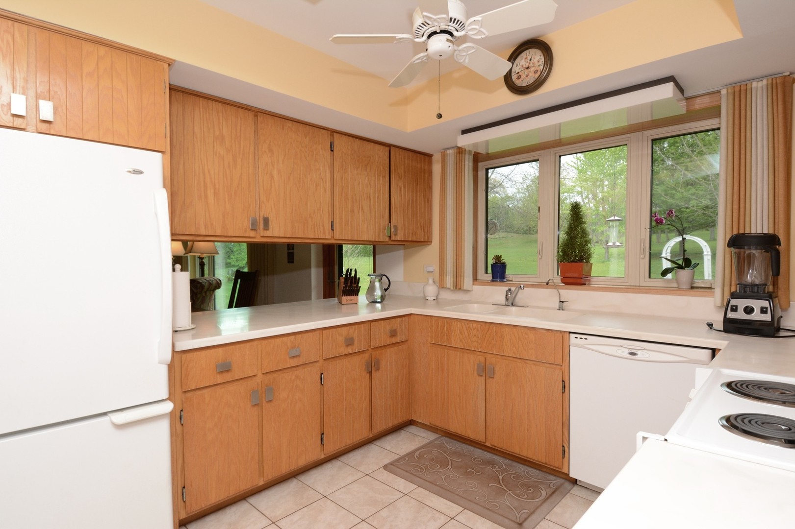 37W271 Weld Road Elgin, IL 60124 - Photo 10 of 34 a kitchen with a sink window and cabinets