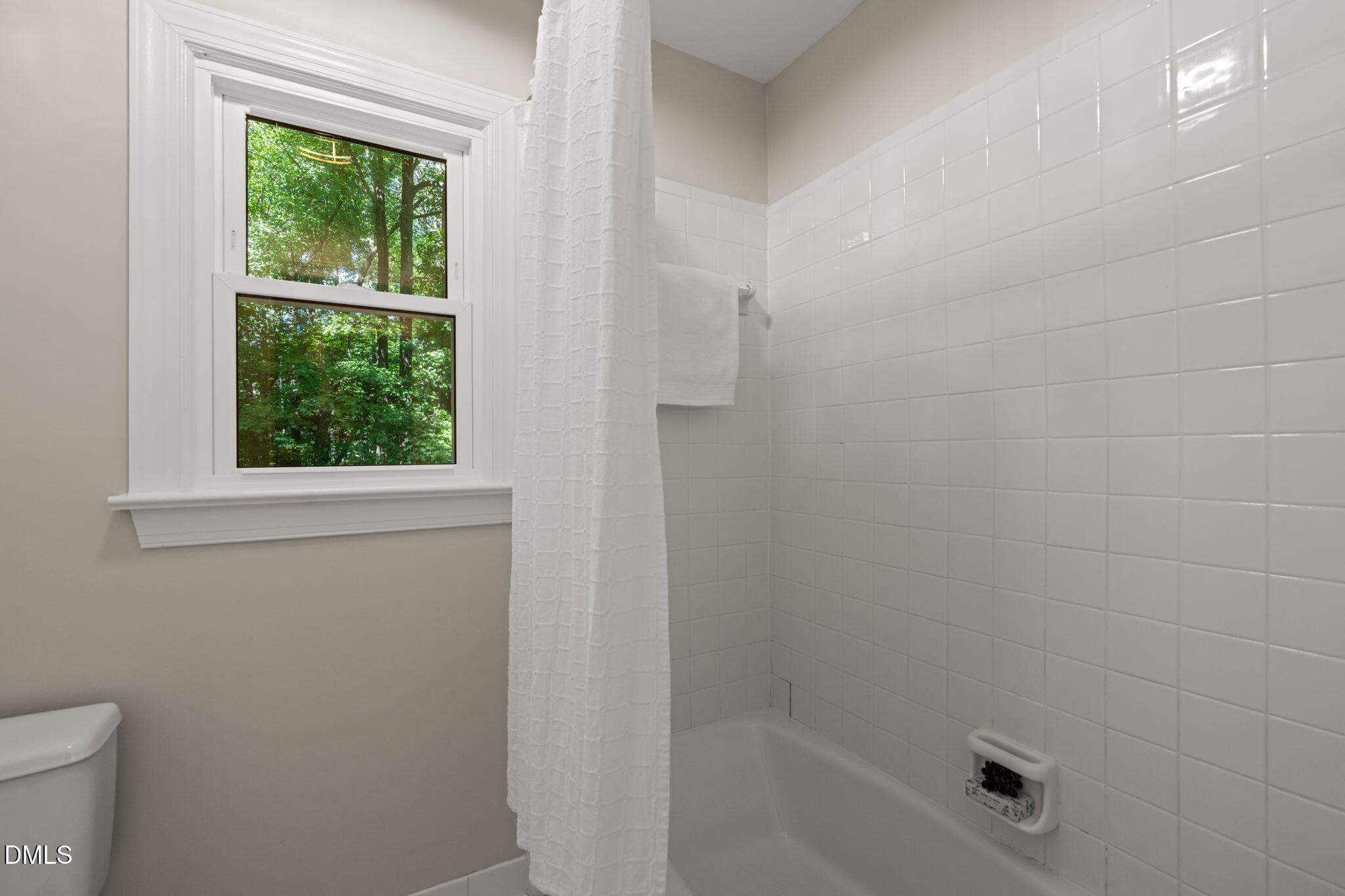 18 Strawberry Ridge Lane Durham, NC 27713 - Photo 36 of 59 a bathroom with a window
