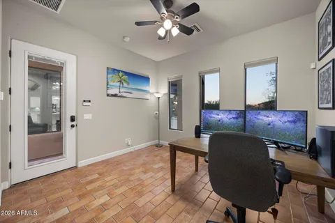 a view of a workspace with furniture