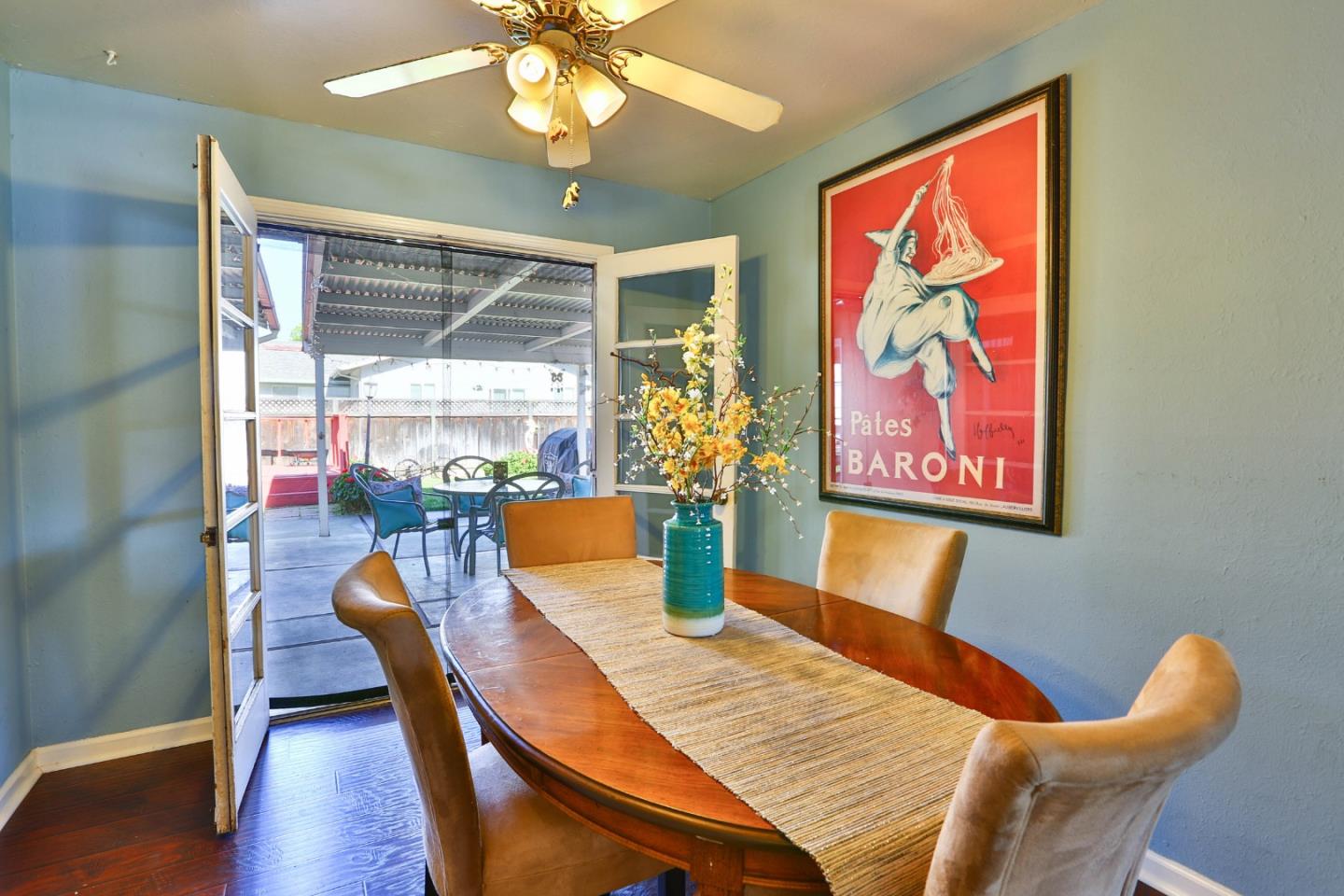 1735 Cunningham Street Santa Clara, CA 95050 - Photo 12 of 38 a view of a dining room with furniture wooden floor and chandelier