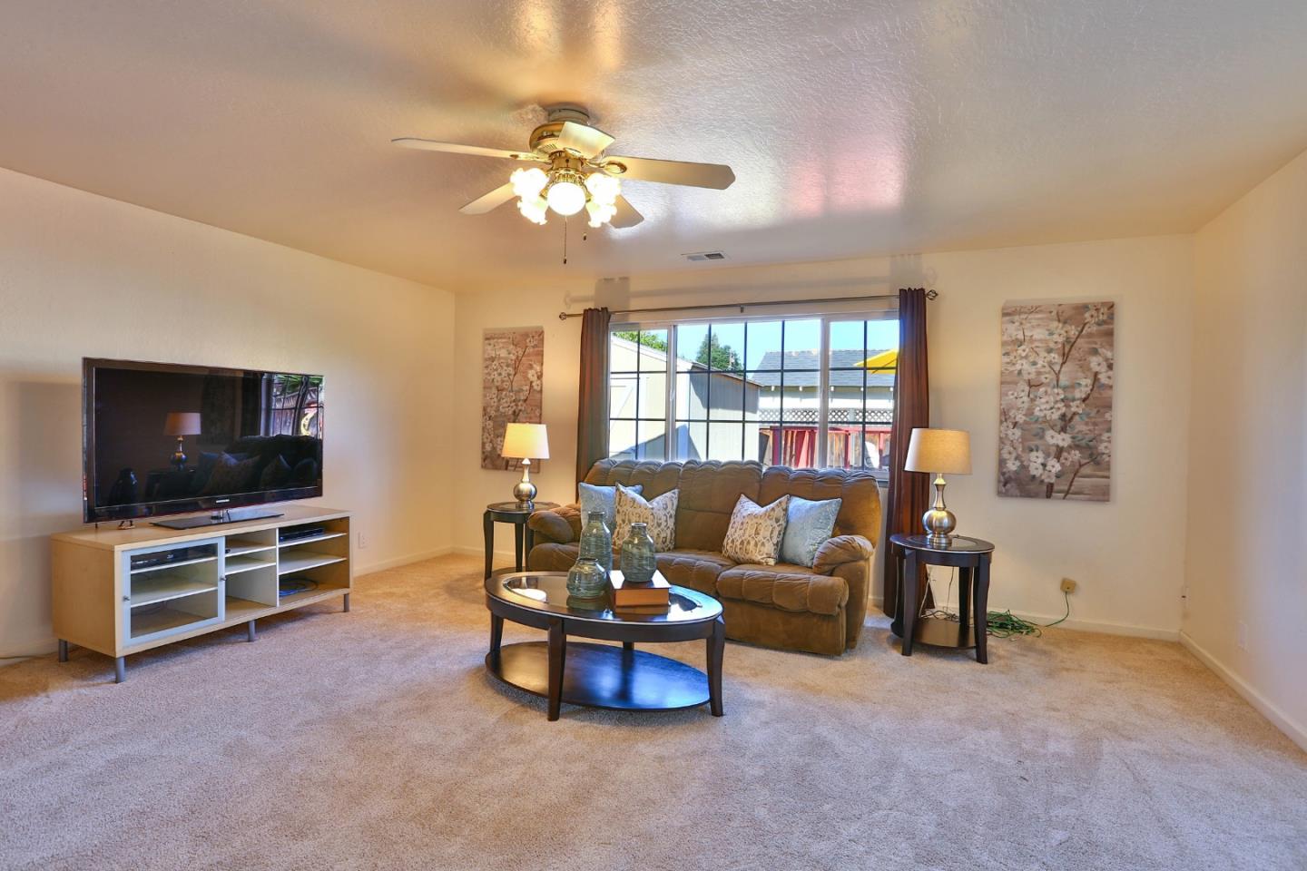 1735 Cunningham Street Santa Clara, CA 95050 - Photo 16 of 38 a living room with furniture and a flat screen tv