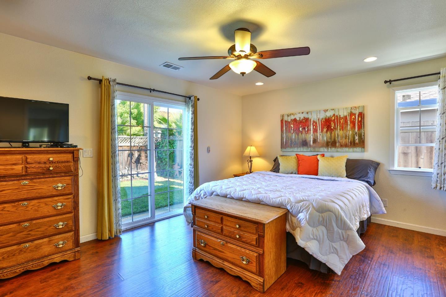 1735 Cunningham Street Santa Clara, CA 95050 - Photo 21 of 38 a bedroom with a bed and wooden floor
