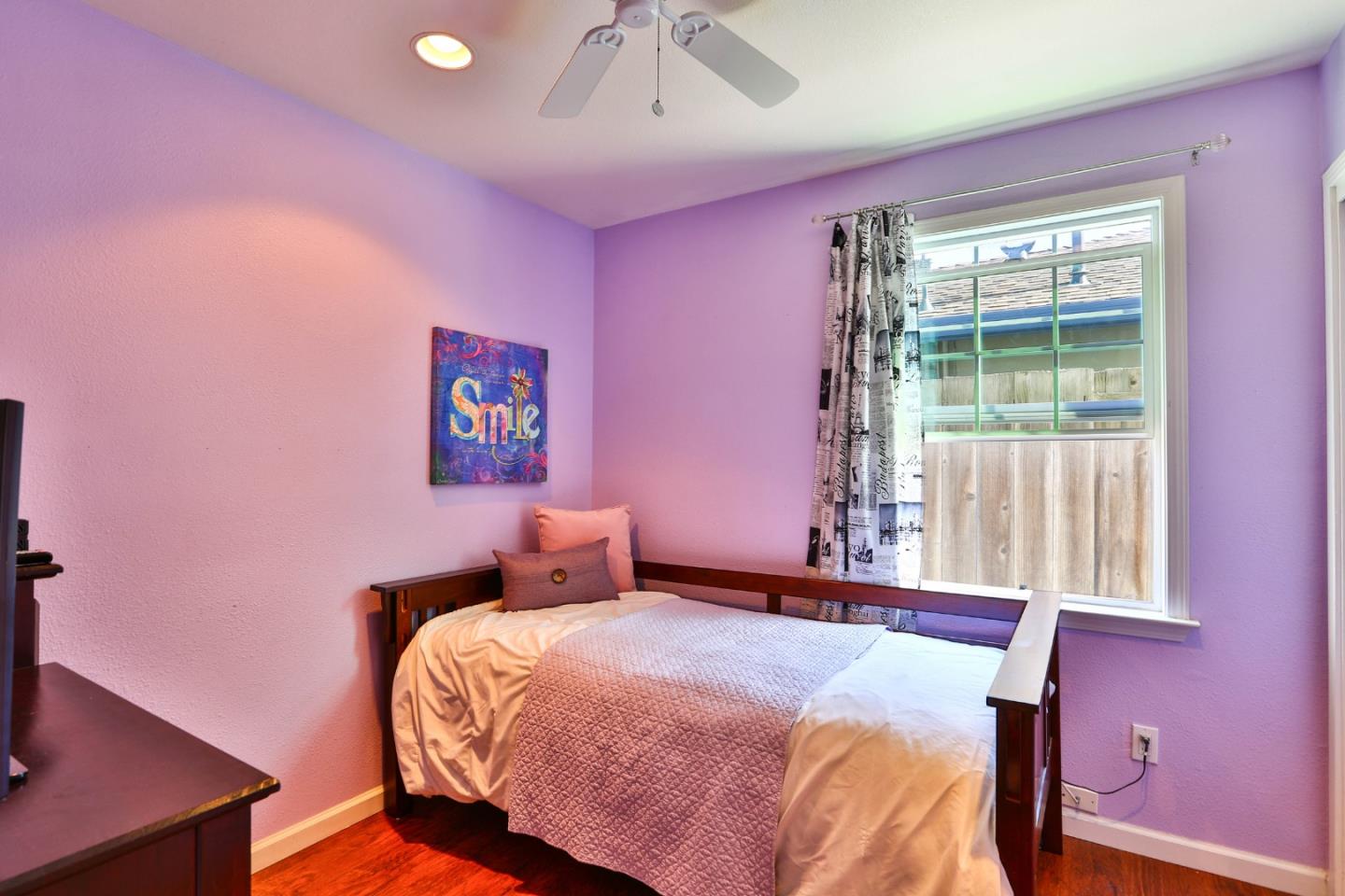 1735 Cunningham Street Santa Clara, CA 95050 - Photo 26 of 38 a bedroom with a bed and a window