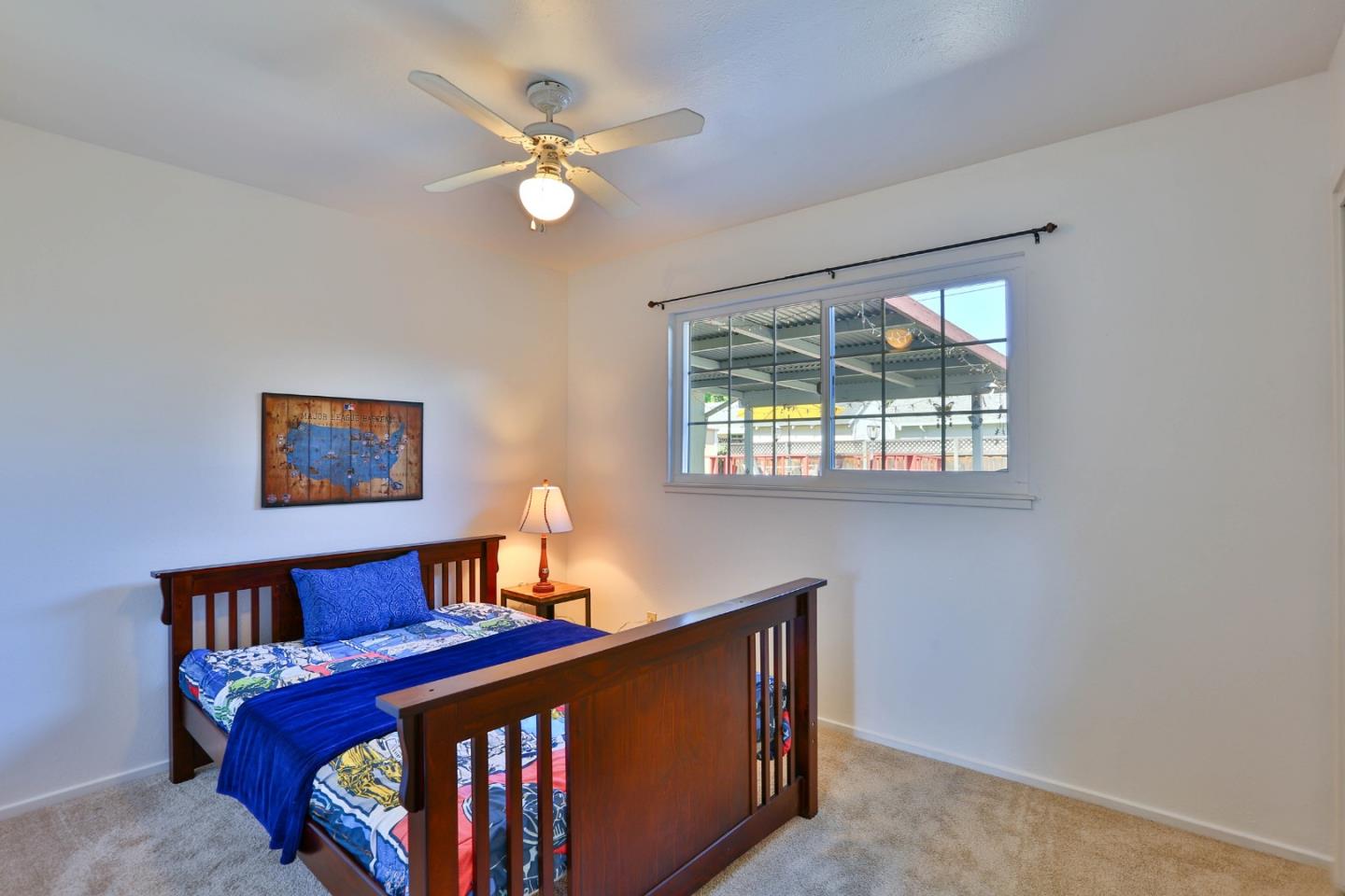 1735 Cunningham Street Santa Clara, CA 95050 - Photo 27 of 38 a bedroom with a bed and a window