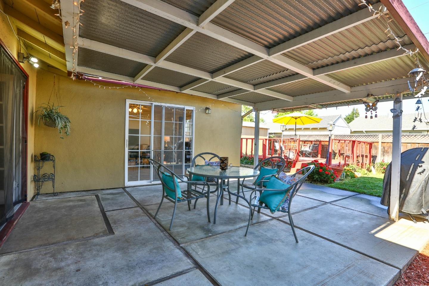1735 Cunningham Street Santa Clara, CA 95050 - Photo 29 of 38 a view of a porch with furniture and a yard