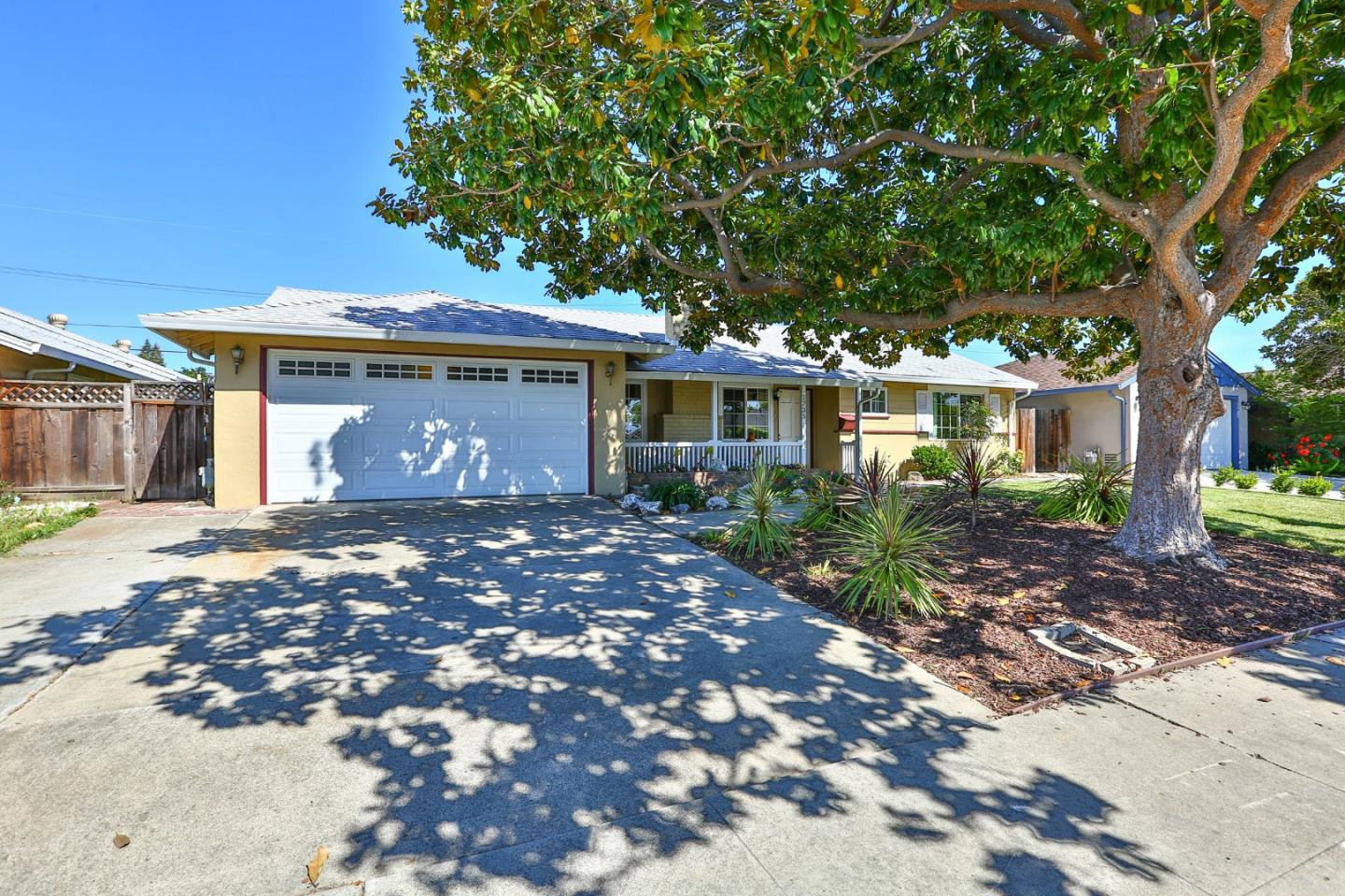 1735 Cunningham Street Santa Clara, CA 95050 - Photo 4 of 38 a front view of a house with a garden