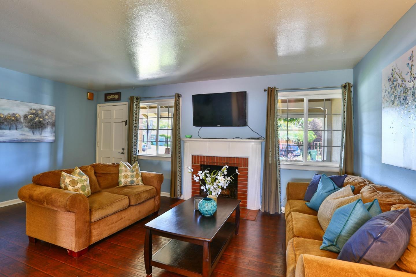 1735 Cunningham Street Santa Clara, CA 95050 - Photo 9 of 38 a living room with furniture fireplace and flat screen tv