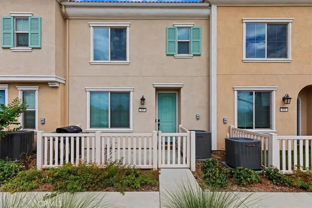 a front view of a house with a porch