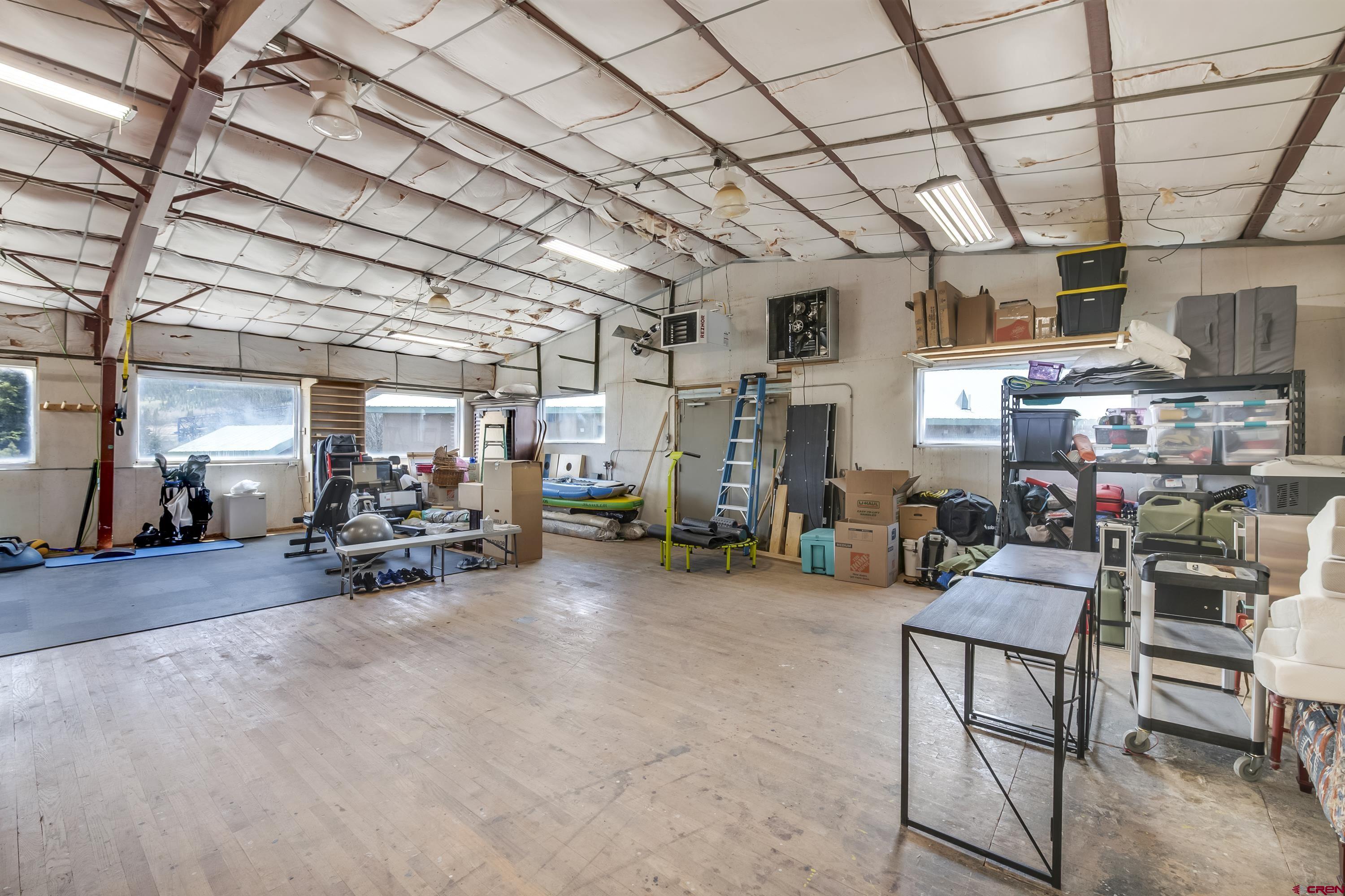 110 Andreas Circle, Unit A Crested Butte, CO 81224 - Photo 12 of 21 a view of a garage with gym equipment