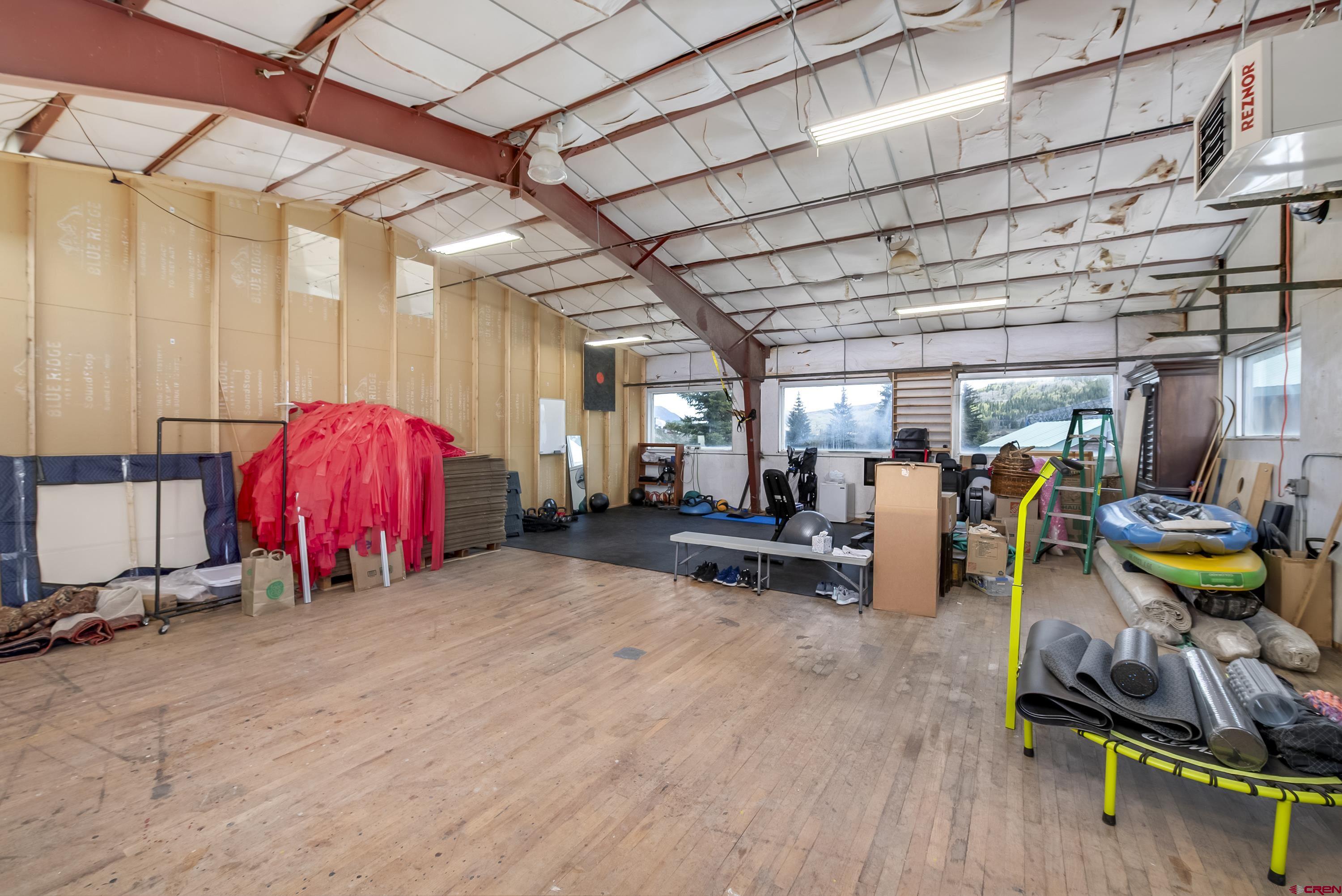 110 Andreas Circle, Unit A Crested Butte, CO 81224 - Photo 13 of 21 a view of a room with gym equipment