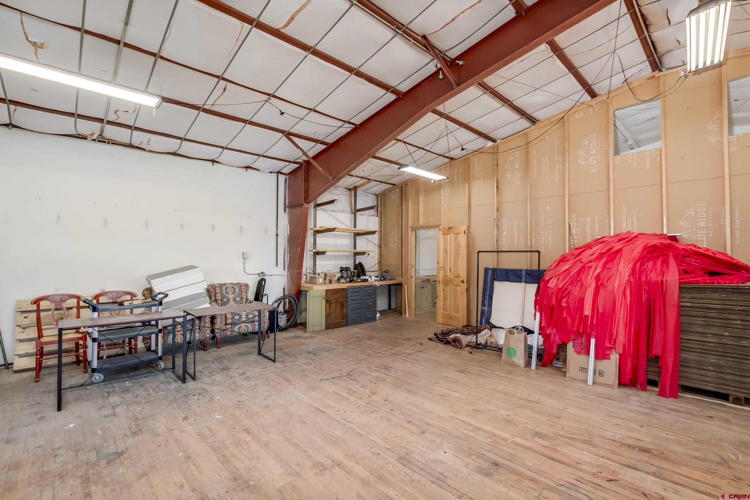 110 Andreas Circle, Unit A Crested Butte, CO 81224 - Photo 15 of 21 a view of a hall with furniture and a tub