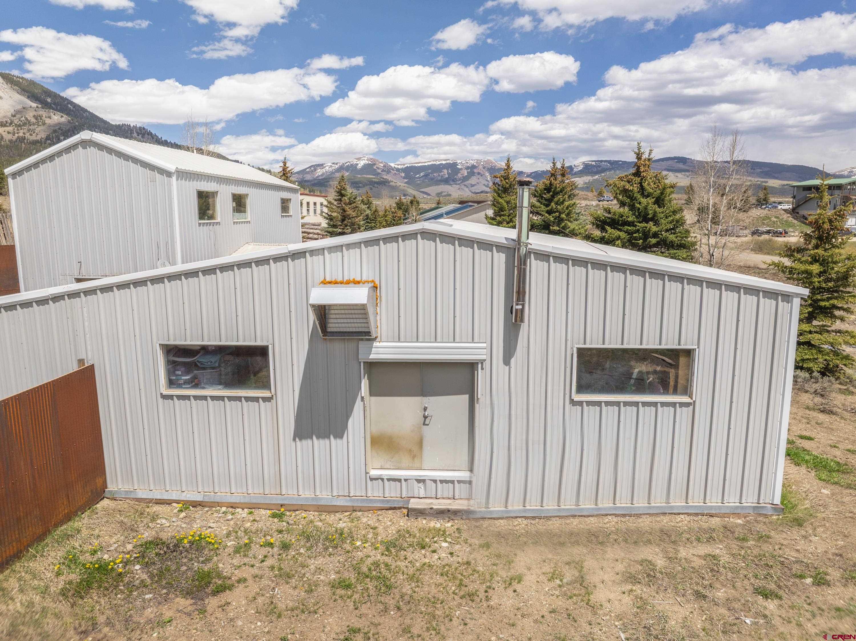 110 Andreas Circle, Unit A Crested Butte, CO 81224 - Photo 21 of 21 a view of a house with a small yard