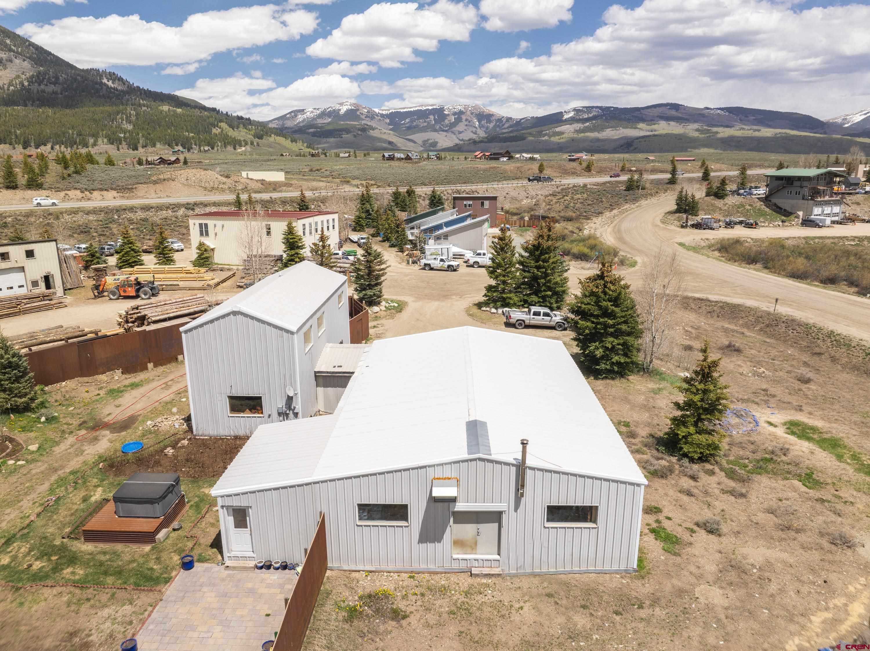 110 Andreas Circle, Unit A Crested Butte, CO 81224 - Photo 4 of 21 aerial view of a house with a yard