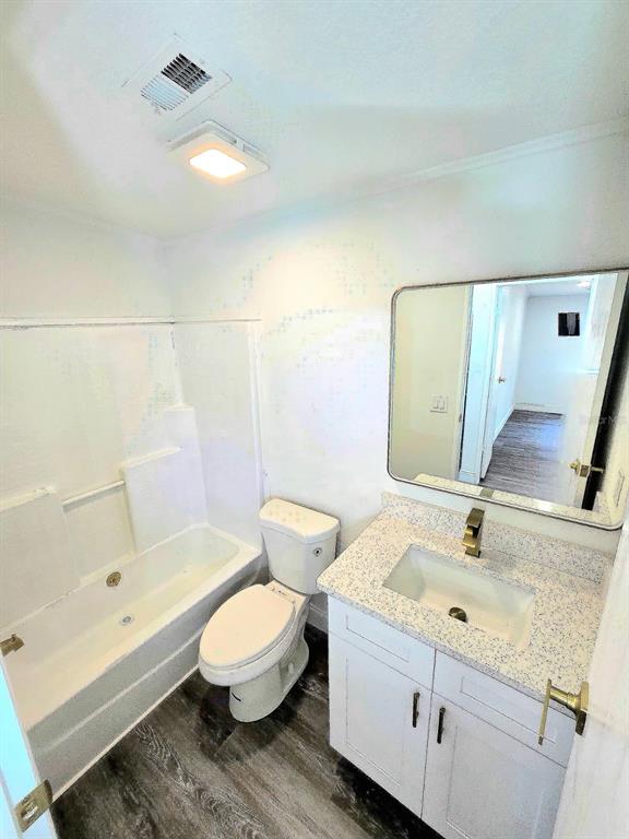 4928 Rollinglen Loop East Lakeland, FL 33810 - Photo 14 of 44 a bathroom with a sink and a mirror