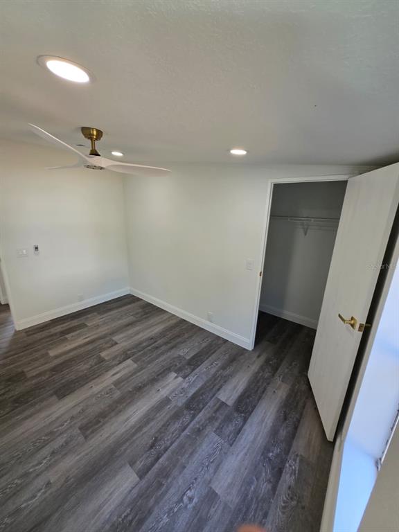 4928 Rollinglen Loop East Lakeland, FL 33810 - Photo 16 of 44 wooden floor in an empty room