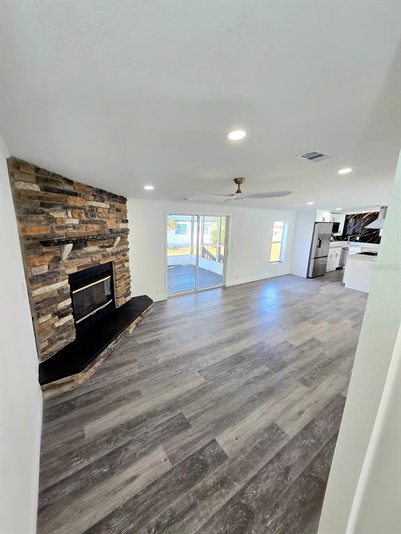 4928 Rollinglen Loop East Lakeland, FL 33810 - Photo 21 of 44 a view of a livingroom with wooden floor