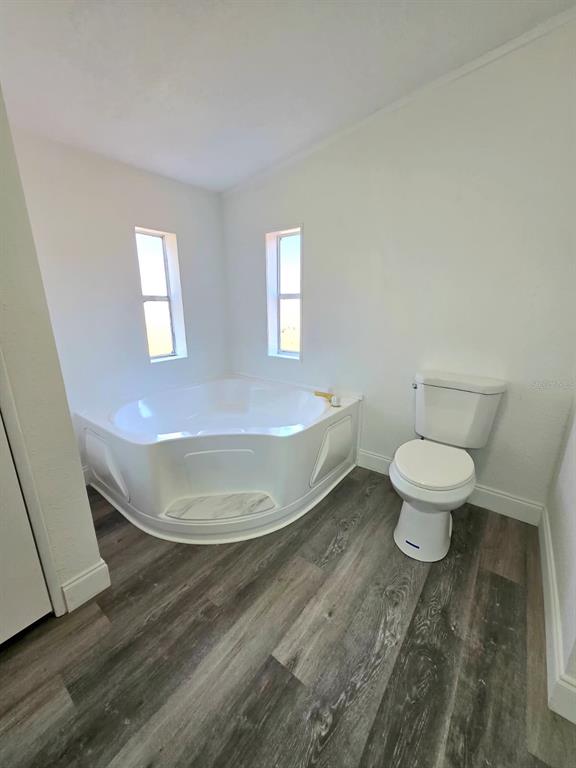 4928 Rollinglen Loop East Lakeland, FL 33810 - Photo 38 of 44 a view of a bathroom with a toilet