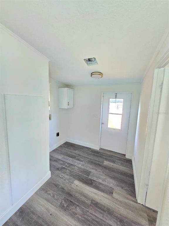 4928 Rollinglen Loop East Lakeland, FL 33810 - Photo 43 of 44 a view of empty room with wooden floor