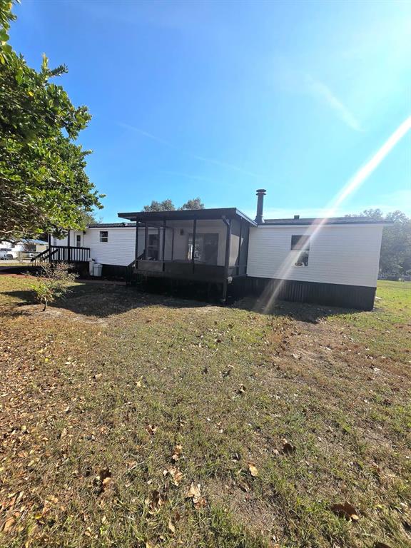 4928 Rollinglen Loop East Lakeland, FL 33810 - Photo 8 of 44 a view of a house with a yard