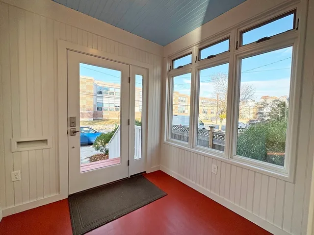 a view of an empty room and window