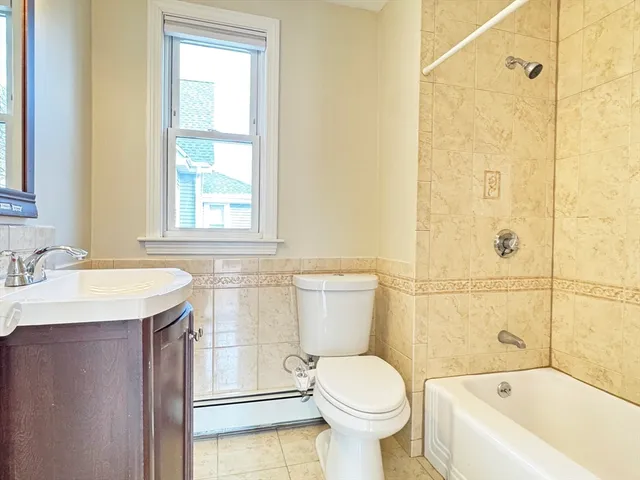 a front view of a house with a garage