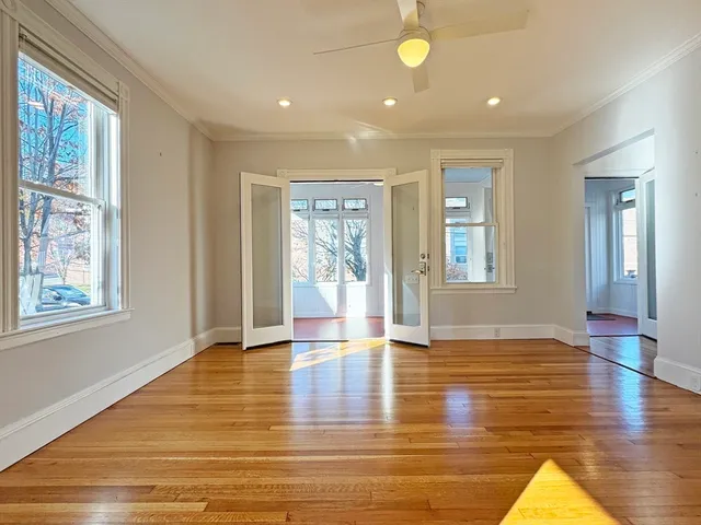 a view of a livingroom with furniture and wooden floor