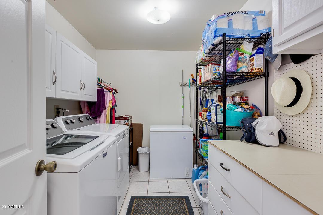 3452 East Nisbet Road Phoenix, AZ 85032 - Photo 24 of 31 a room with storage and utility