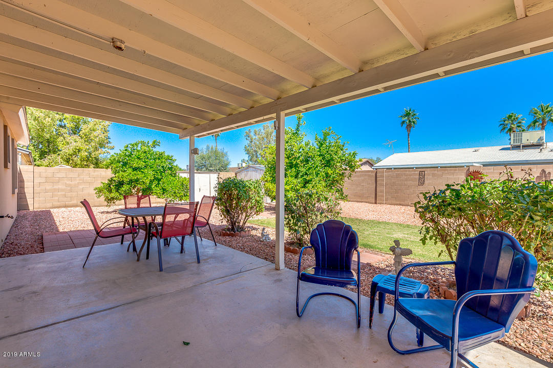 3452 East Nisbet Road Phoenix, AZ 85032 - Photo 31 of 31 a view of a two chairs in the patio