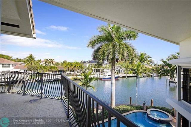 a view of a balcony with lake view