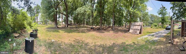 6807 Allentown Road Temple Hills, MD 20748 - Photo 6 of 8 a view of a yard with trees