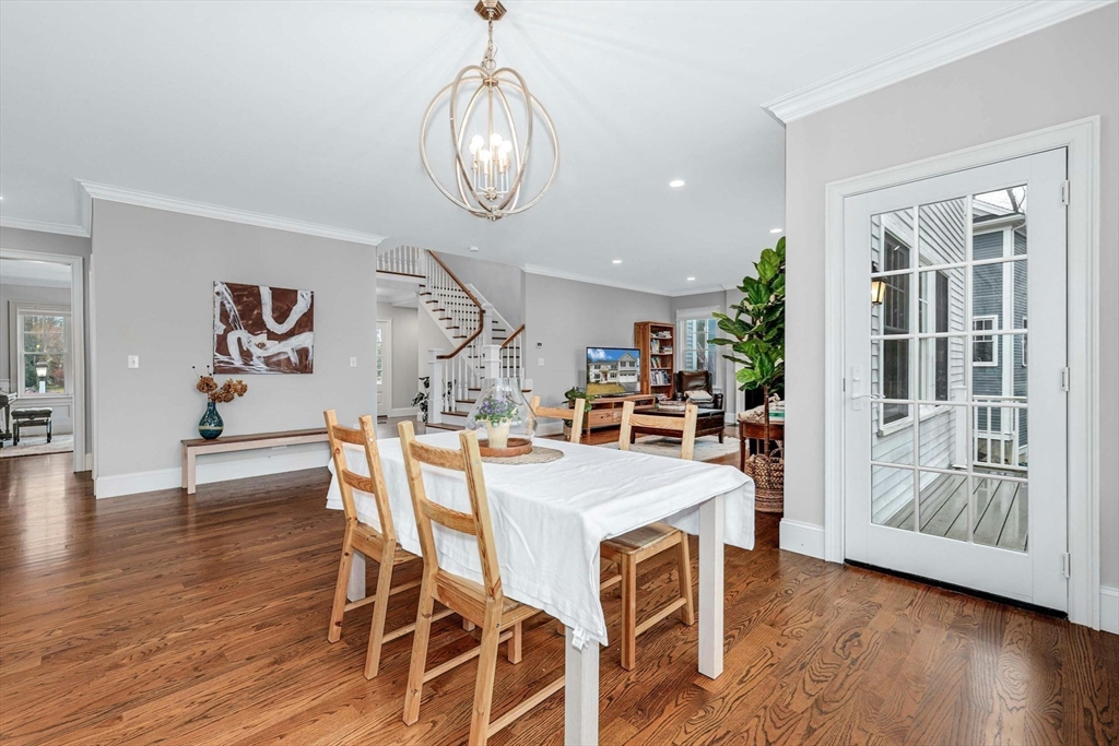 271 Monsen Road Concord, MA 01742 - Photo 17 of 42 a view of a dining room with furniture and wooden floor