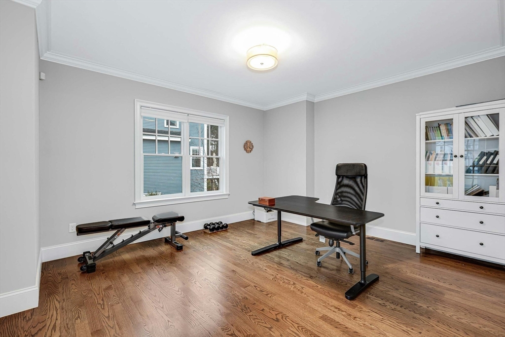 271 Monsen Road Concord, MA 01742 - Photo 23 of 42 a view of a workspace with furniture and a window