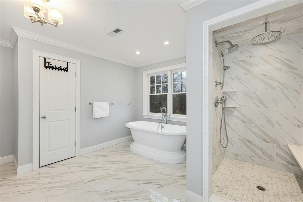 271 Monsen Road Concord, MA 01742 - Photo 29 of 42 a bathroom with a sink a toilet and shower