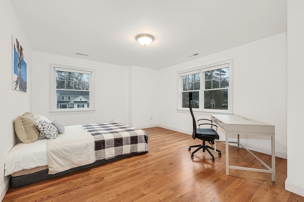271 Monsen Road Concord, MA 01742 - Photo 31 of 42 a bedroom with furniture and a window