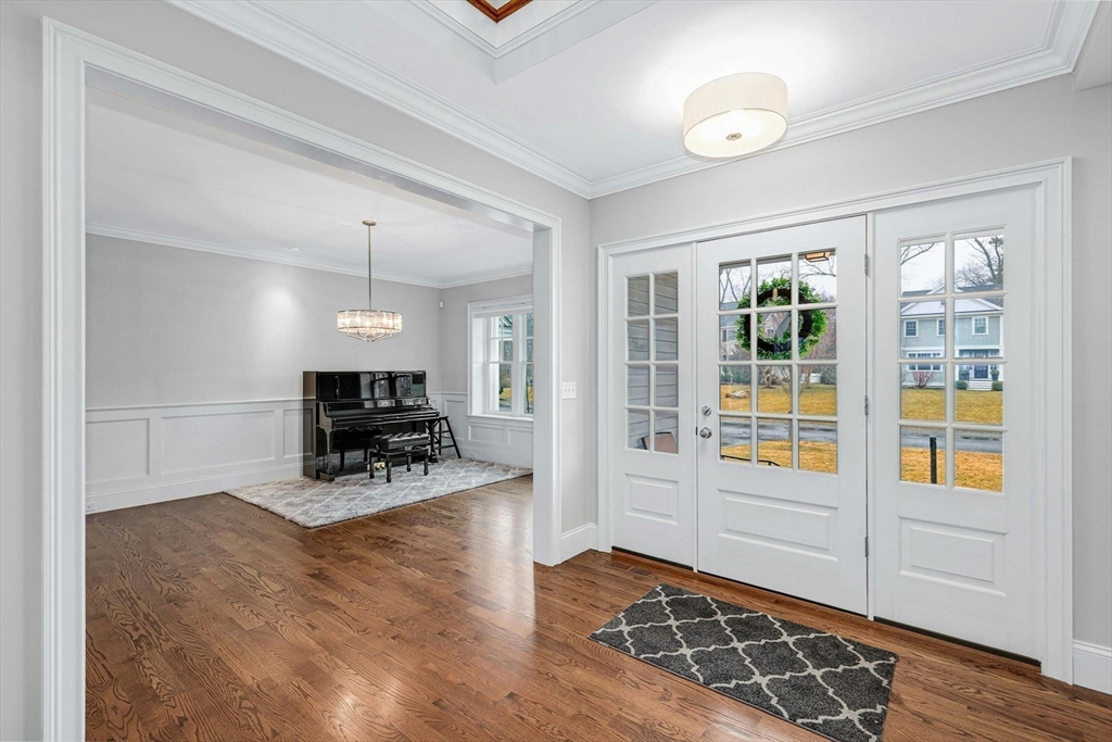 271 Monsen Road Concord, MA 01742 - Photo 4 of 42 a view of livingroom with furniture and wooden floor
