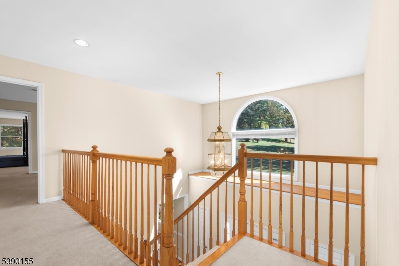 5 Sky View Garden Road Lebanon, NJ 08833 - Photo 19 of 42 a view of a hallway with windows