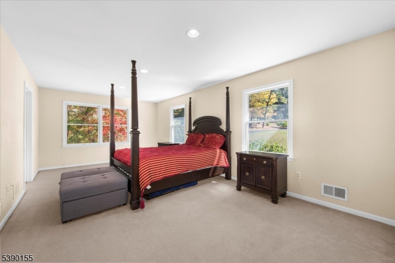 5 Sky View Garden Road Lebanon, NJ 08833 - Photo 22 of 42 a bedroom with a bed and a window