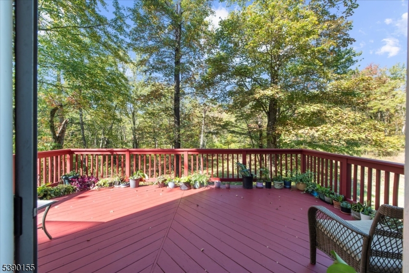 5 Sky View Garden Road Lebanon, NJ 08833 - Photo 38 of 42 a balcony with wooden floor and fence