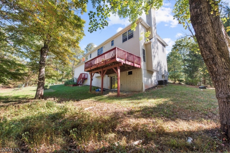 5 Sky View Garden Road Lebanon, NJ 08833 - Photo 39 of 42 a view of a house with a yard