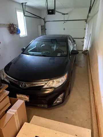 a car parked in an empty room