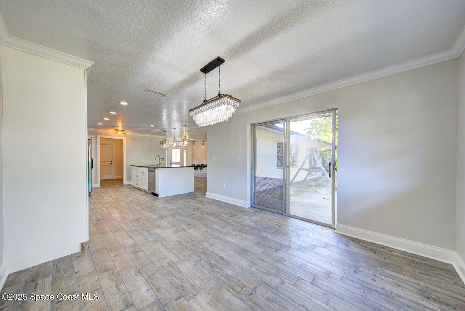 1240 St George Road Merritt Island, FL 32952 - Photo 19 of 46 dining room with slider to patio