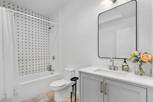 a bedroom with bed and window