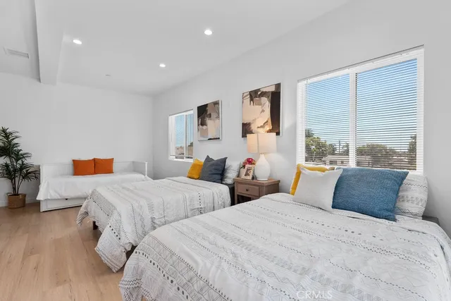 a view of a hallway with washer and dryer