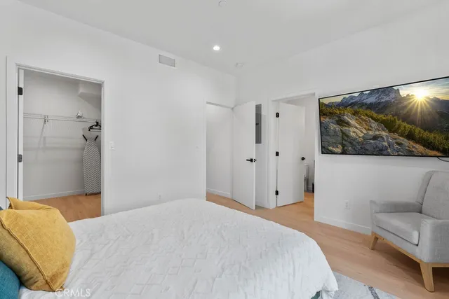 a bathroom with a double vanity sink mirror double and shower