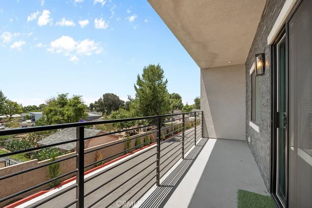 a view of balcony with double vanity