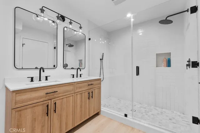 a view of kitchen with a potted plant on a sink